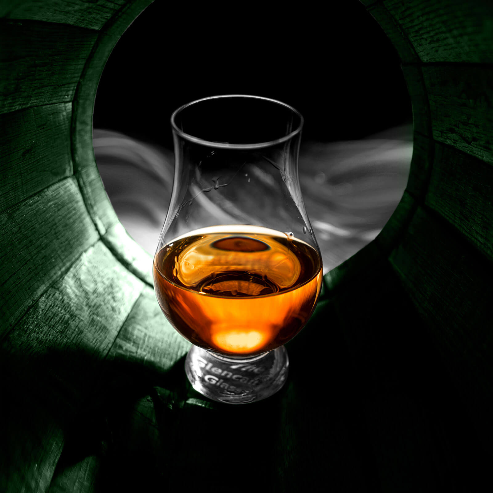 glass with oaksmith internationalinside a barrel